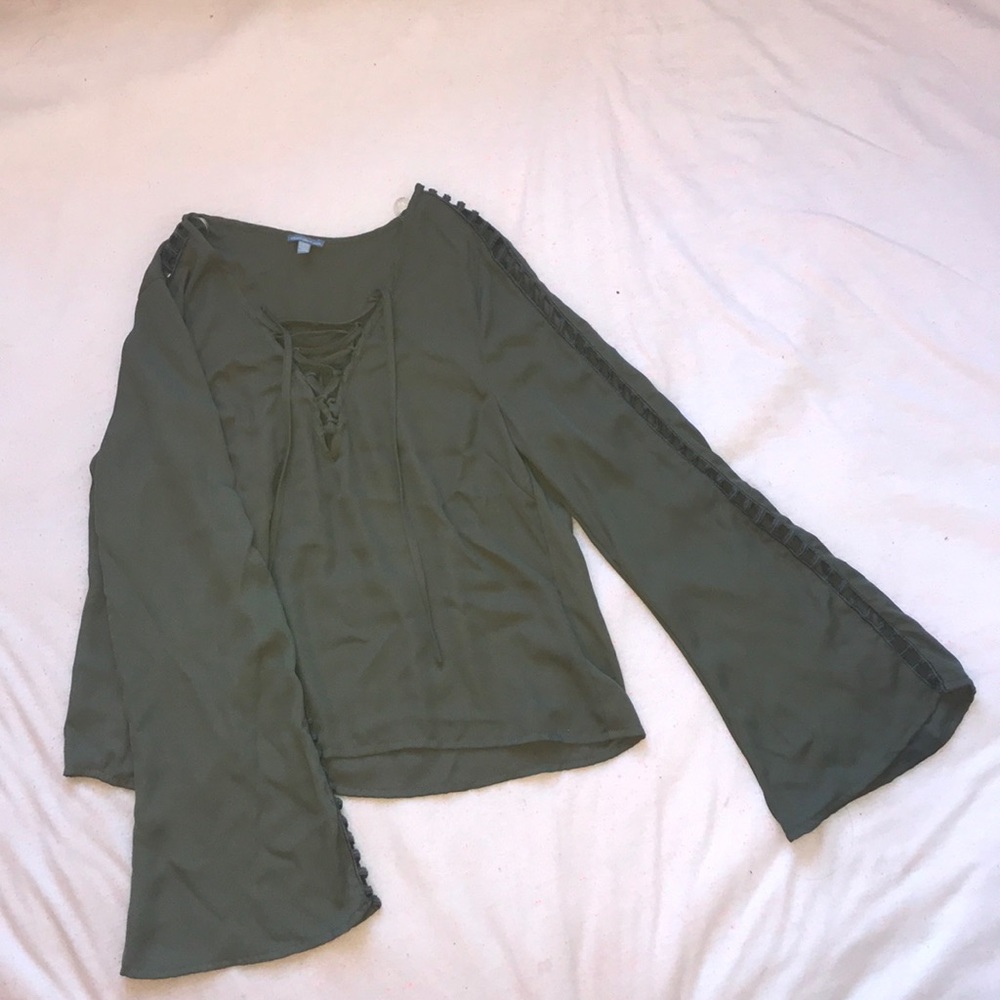 green blouse with cut outs